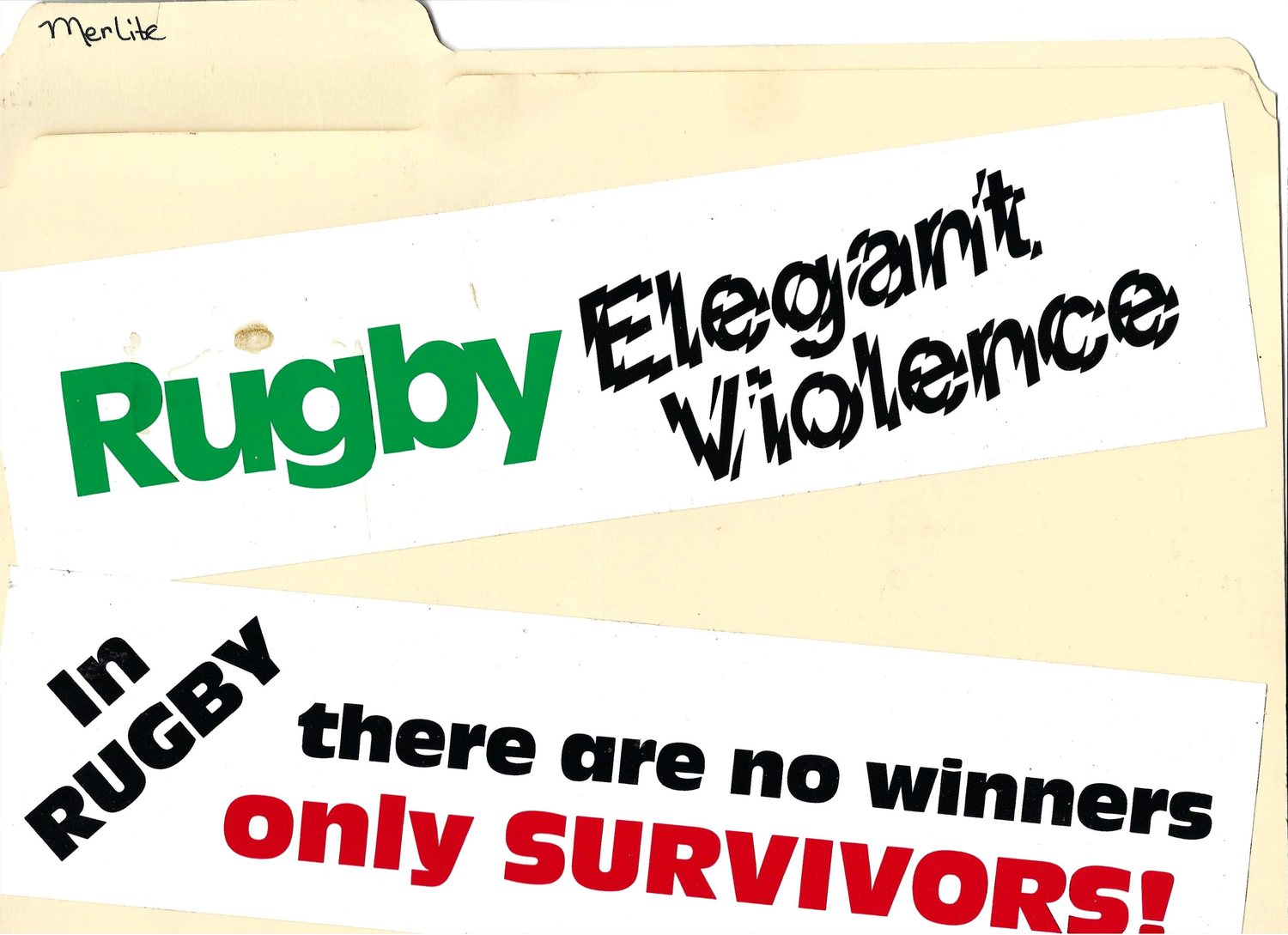 Two rugby bumper stickers on a manila folder: Rugby Elegant Violence, and In Rugby there are no winners only Survivors