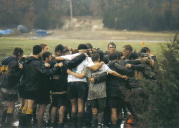 Mizzou players in a huddle at the 1997 St. Louis Ruggerfest