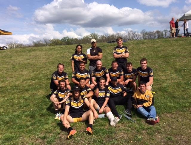 The Mizzou squad sitting together on a grass bank at the end of the 2015-16 season