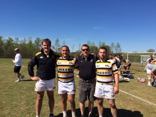 Three Mizzou seniors in kit with a coach after their last fifteens match in April 2017