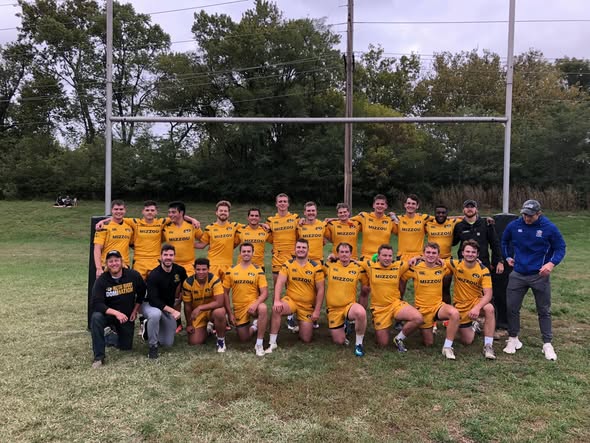 The Mizzou squad photographed in their new gold kit after beating Oklahoma State 65-5