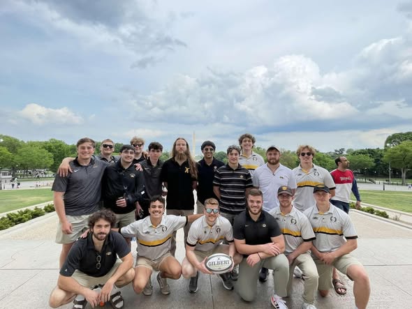 Mizzou players gathered with a trophy during the spring 2023 season
