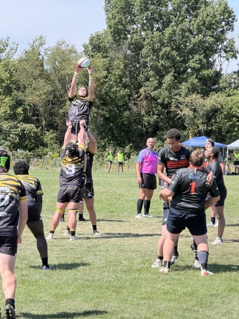 A Mizzou jumper takes a clean lineout ball above the Oklahoma State pack