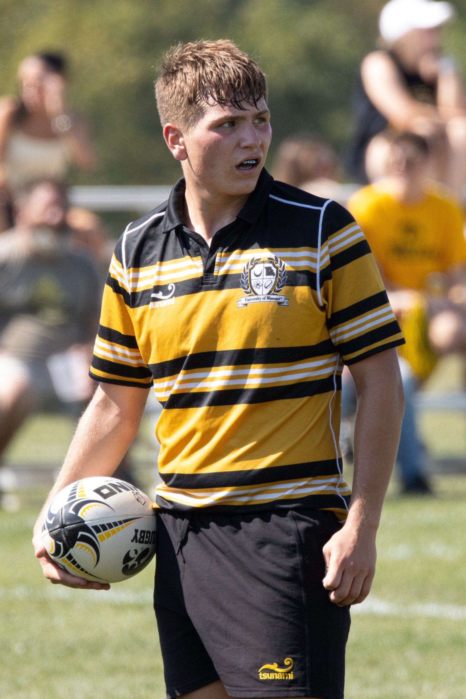 A Mizzou player stands with the ball in hand before the Iowa match