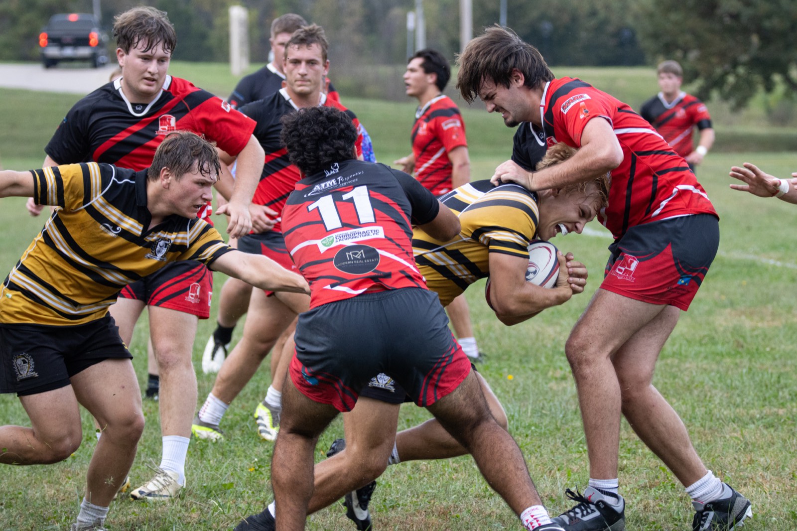 Mizzou and Nebraska players contest possession at a ruck