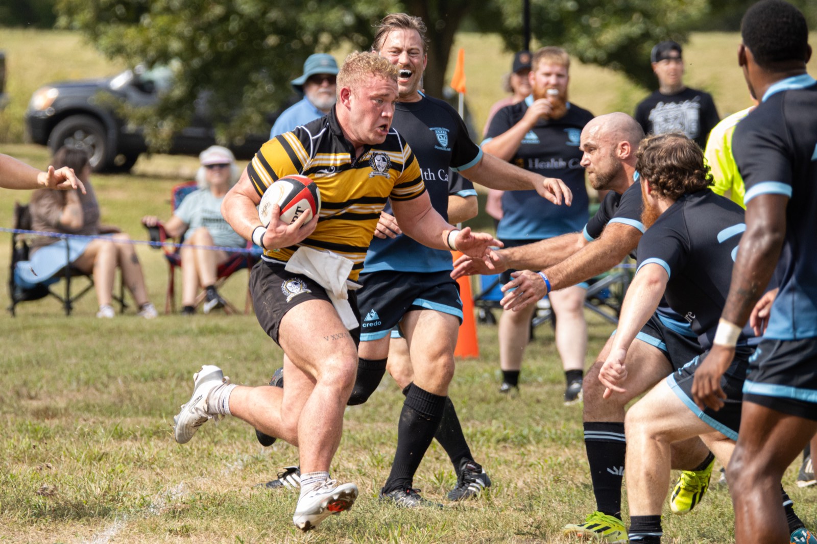 A Mizzou ball carrier breaks through the Columbia Outlaws defense