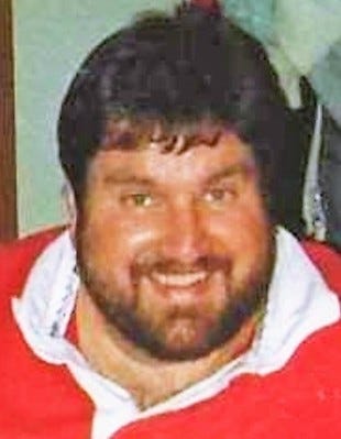 John &ldquo;Tubby&rdquo; Stewart in a red rugby jersey