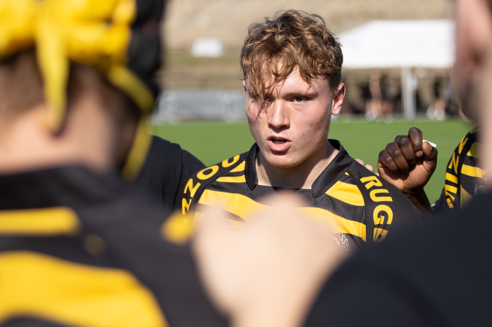 A Mizzou player speaks to teammates in the huddle