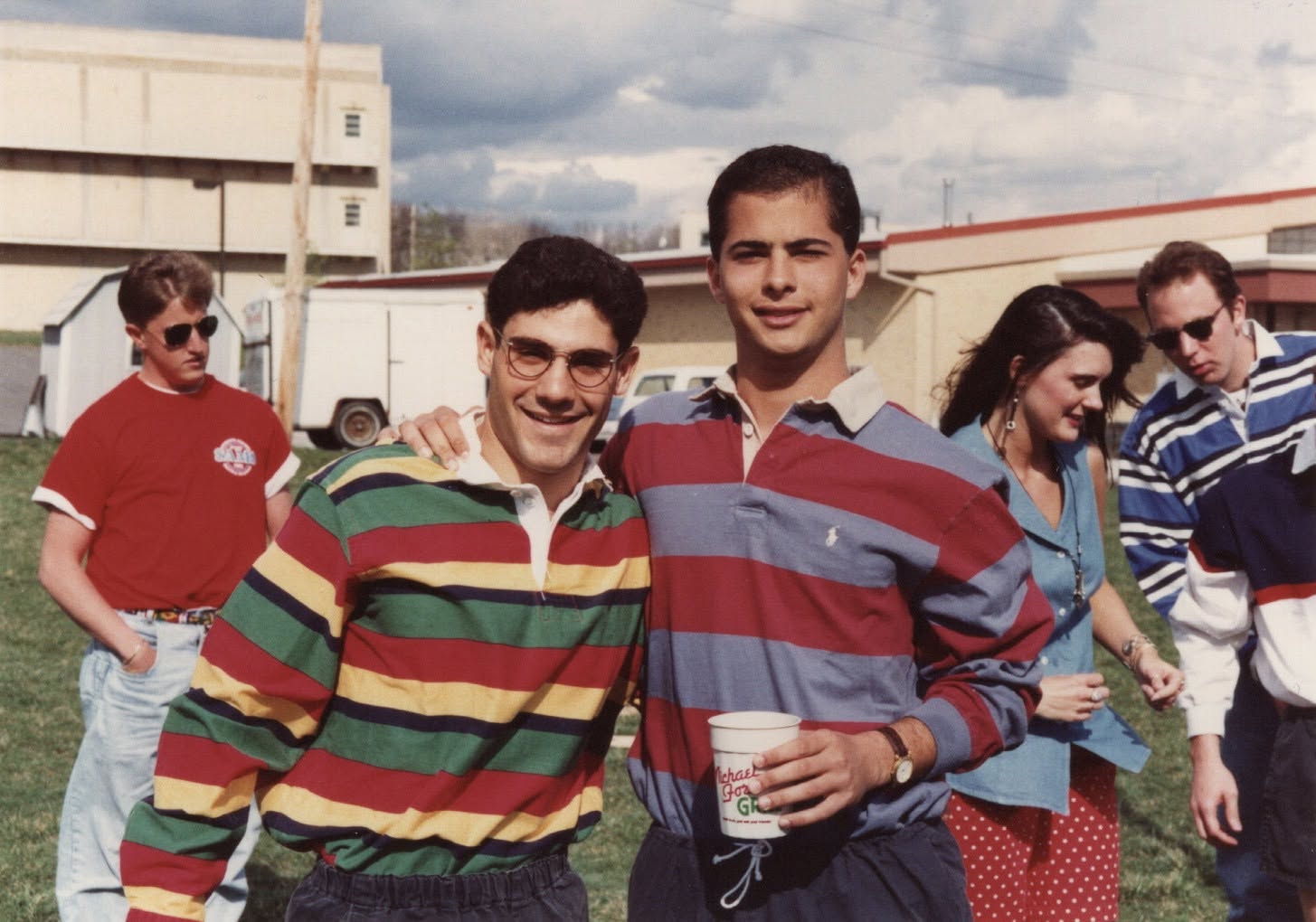 John Cohen and Joe Zwillenberg with others outside a building after a match