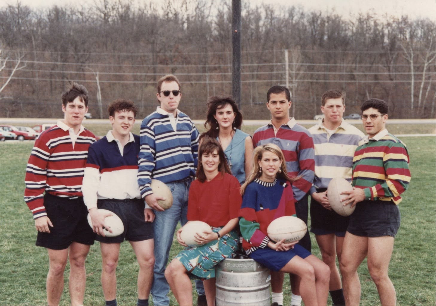 The same group in striped rugby shirts, a second frame