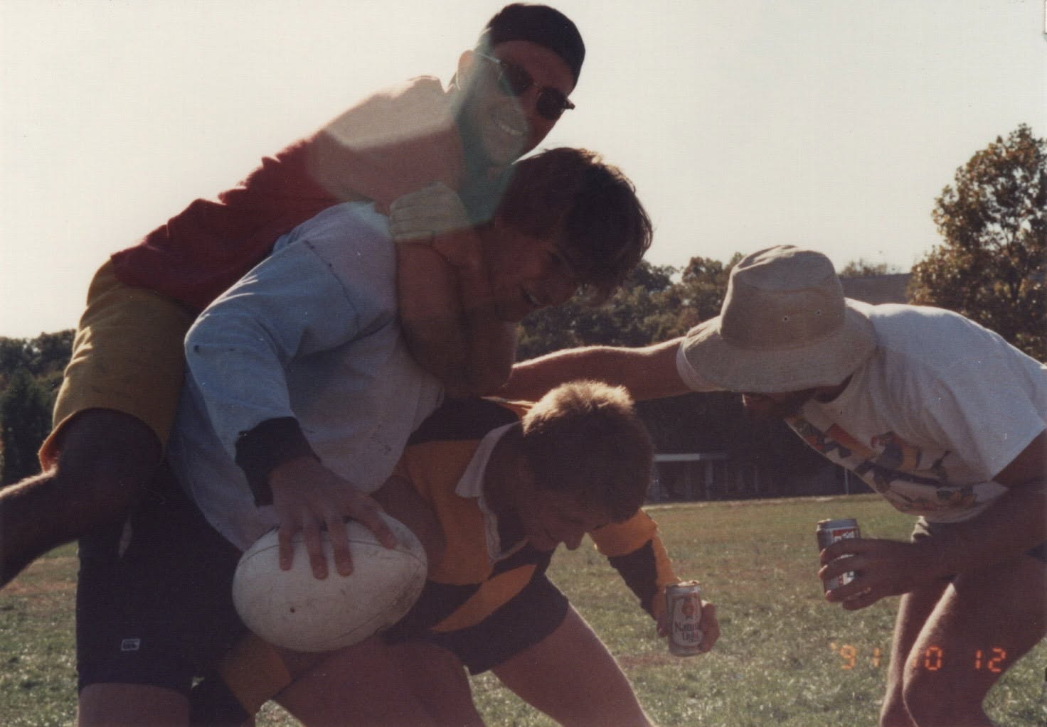 Chris Justice, Mark Blaine and Rob Hoens contest the ball in a maul