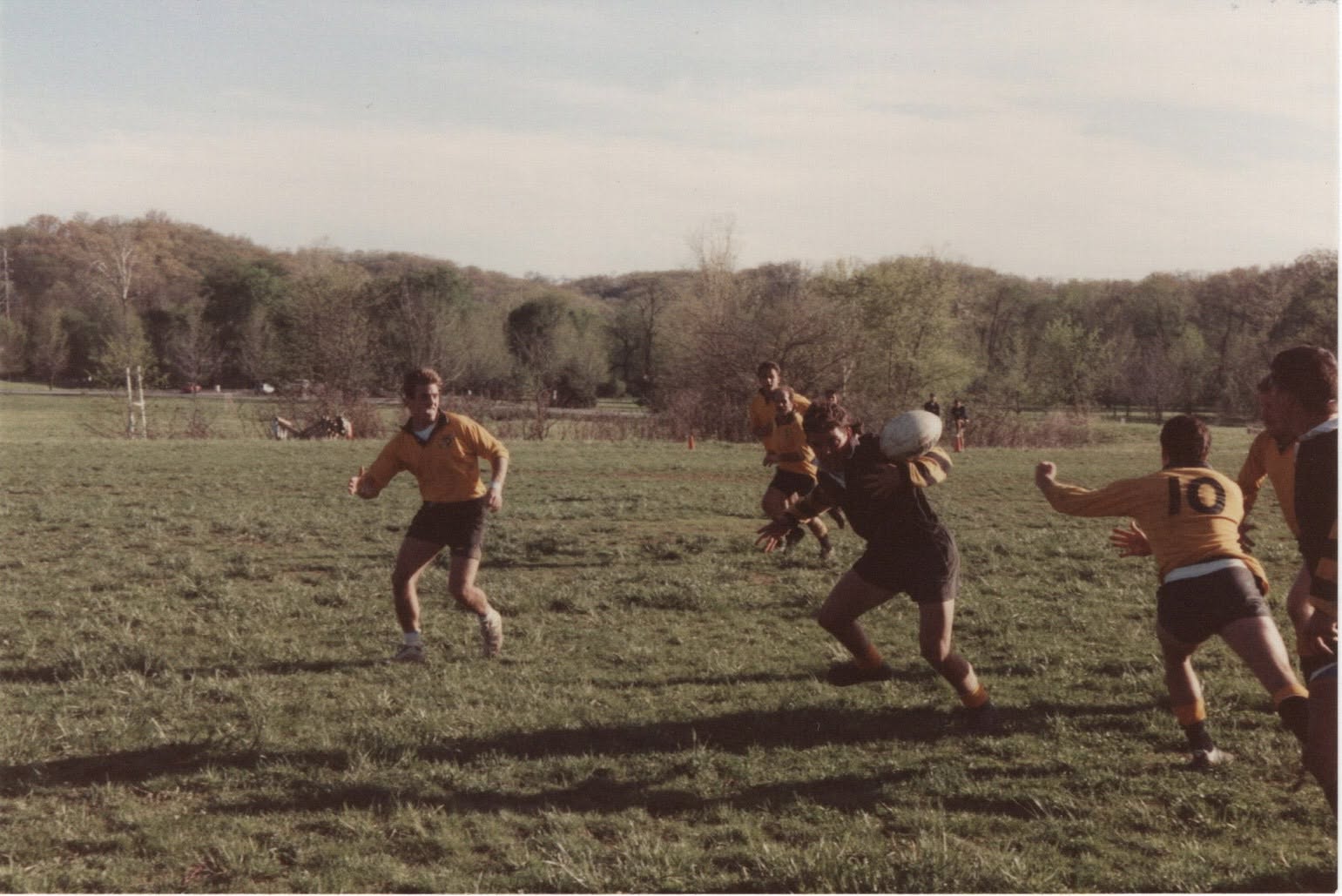 Play moves across an open field in autumn